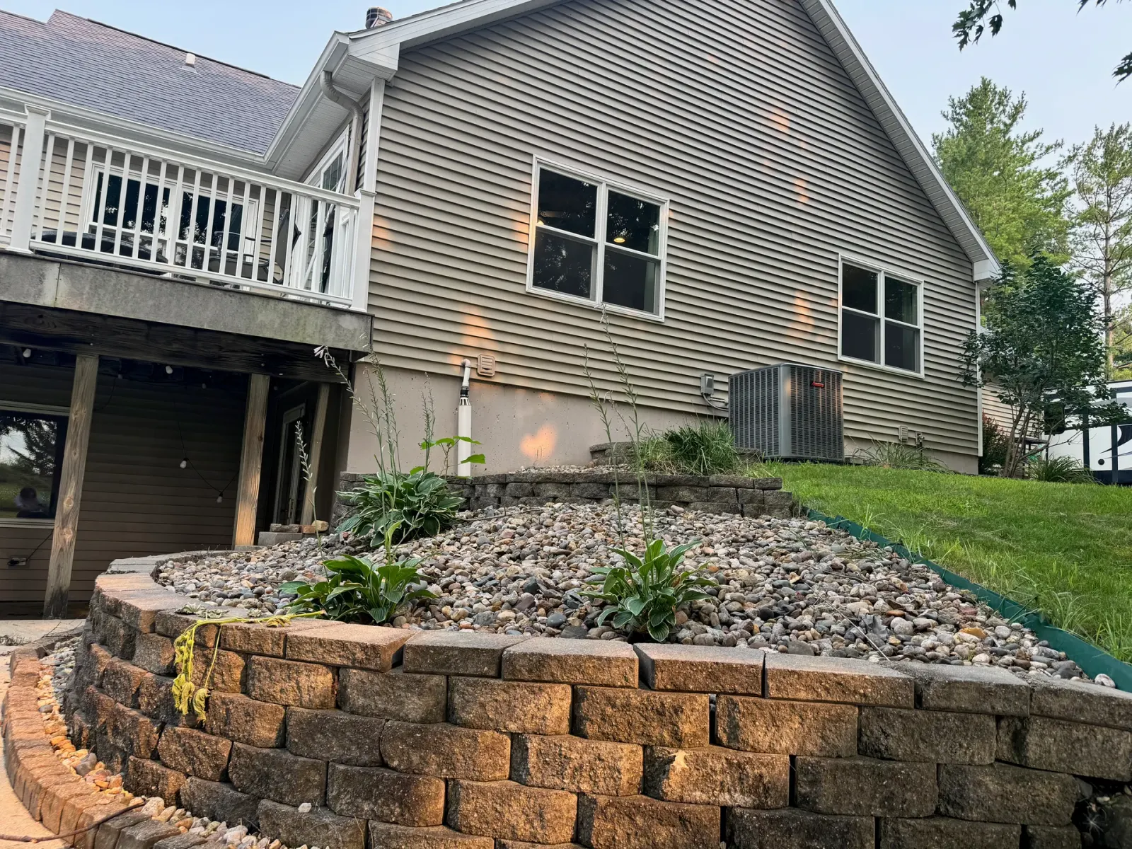 10908 NW 107th Street, Granger, Iowa - Stone Retaining Wall And Plantings