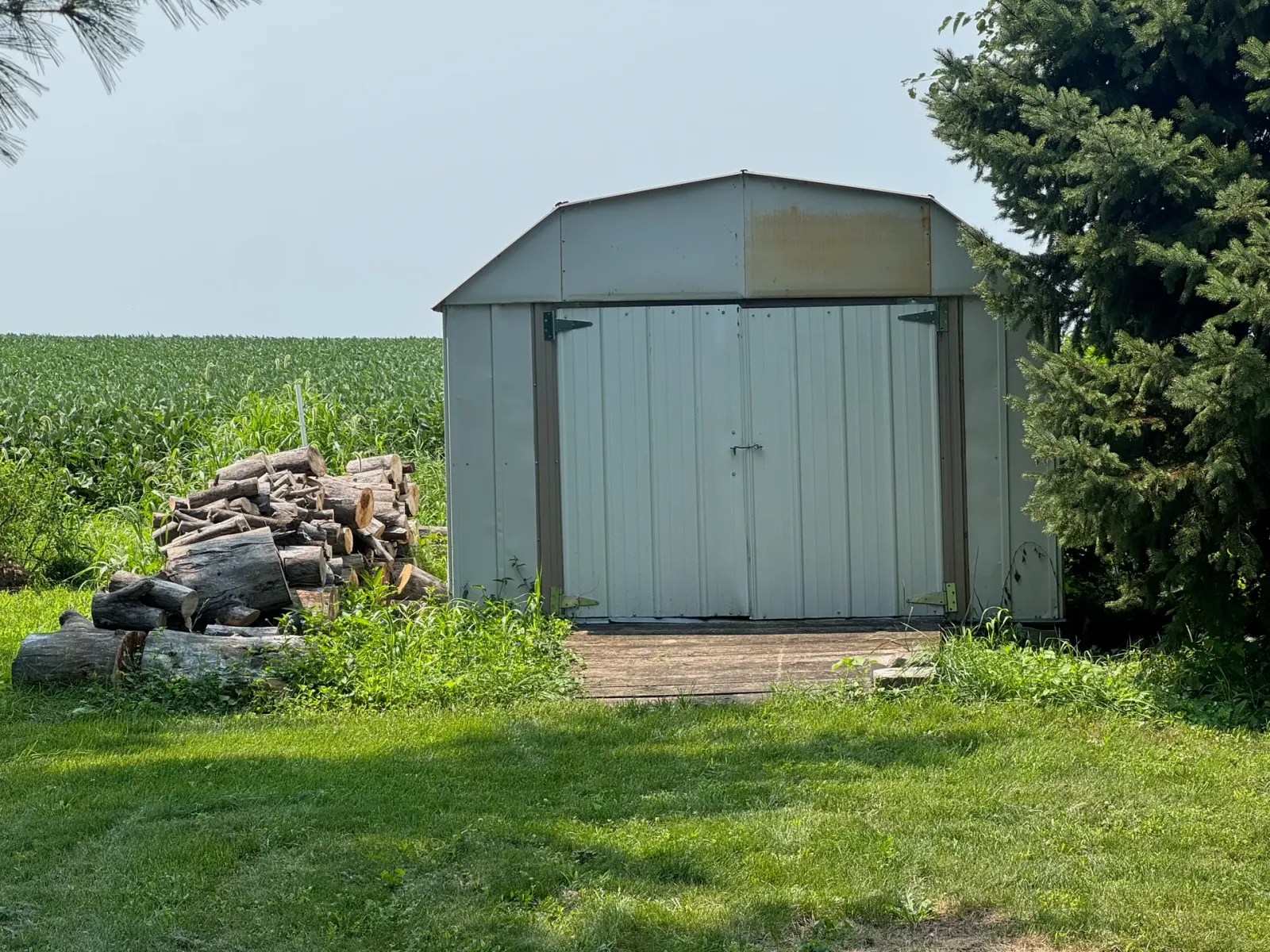 10908 NW 107th Street, Granger, Iowa - Doors And Woodpile